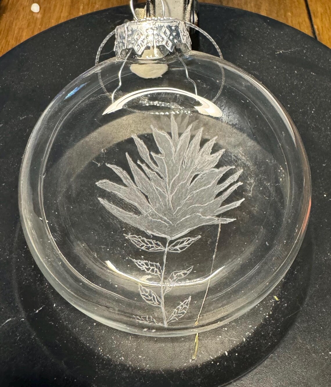 Round Glass Christmas Ornament With Native American Paint Brush Flower