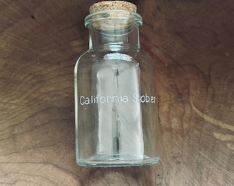 Frasco de vidrio con tapa de corcho (aproximadamente 140 ml). ¡Sobrio en California!