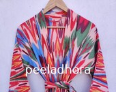 Handwoven Uzbek Ikat Chapan ,coat ,robe,kaftan ,jacket. Hand-dyed, hand loomed natural cotton silk organic ikat from Uzbekistan.