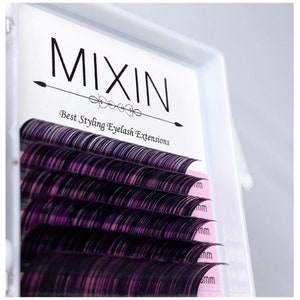 May include: A close-up of a box of purple eyelash extensions labeled "MIXIN Best Styling Eyelash Extensions".