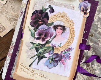 Shabby chic junk Journal made of gorgeous shades of purples with lots of beautiful florals.