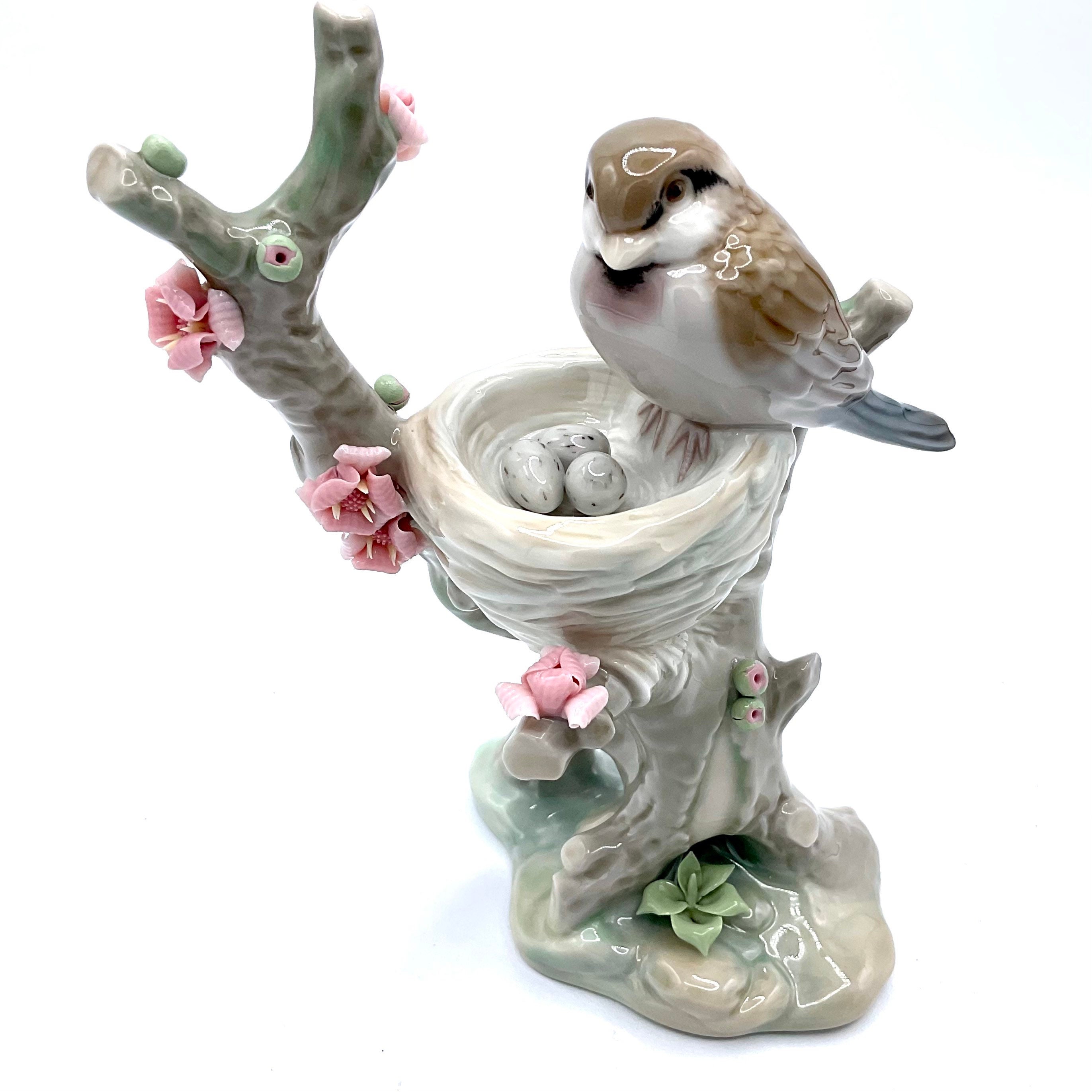 Lladro bird in nest figuerine