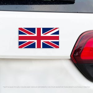 May include: A rectangular sticker featuring the Union Jack, the national flag of the United Kingdom. The flag design includes red, white, and blue colors. The sticker is affixed to a white surface, likely a vehicle.