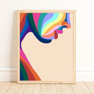 May include: Abstract art print of a colorful face with a rainbow design. The face is outlined in black and the background is a light peach color.