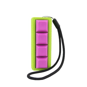 Picky Clicky™ Clicking Cylinder fidget with textured sides  Easy travel fidget toy with sensory feedback design.