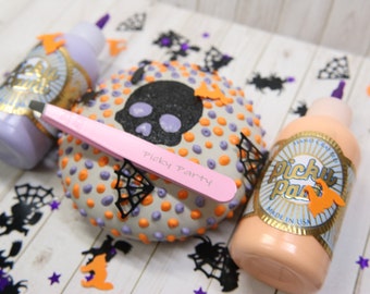 Kit de cabeza de calavera grabada en una piedra de punteo suave (pinzas incluidas)