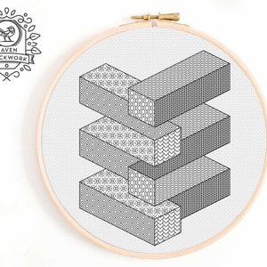 May include: Black and white geometric pattern embroidery design in a round wooden embroidery hoop. The design features four stacked cubes with different patterns on each side.