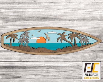 May include: A wooden cutout of a surfboard with a sunset scene. The scene includes palm trees, a setting sun, and a seagull flying over the ocean.
