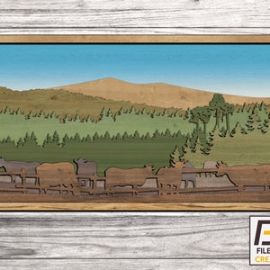 May include: A wooden wall art piece depicting a line of brown cows walking through a green forest with a mountain range in the background.