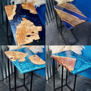 May include: Four different side tables with black metal legs and epoxy resin tops. The tops are made of wood with blue and brown swirls.