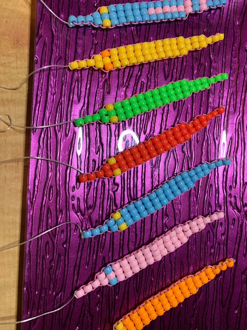A Kandi worm on a string Etsy