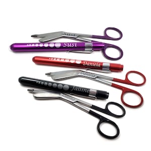 May include: Four pairs of medical scissors with a light attached to the handle. Each light is engraved with a different name: Susi, Daniela, and Jalline. The scissors are in various colors, including purple, red, and black.