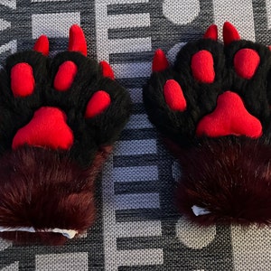 black and red fursuit paws
