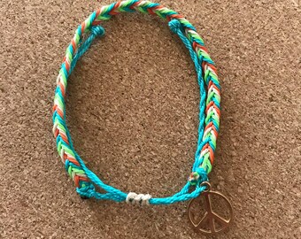 HANDMADE peace & love themed adjustable FISHTAIL BRACELET with gold peace alloy charm