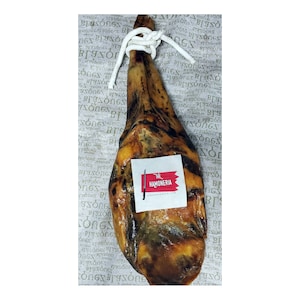 May include: A whole, cured ham leg, also known as a Jamón, with a dark brown, mottled exterior. The ham is tied with twine and has a white label with red text that reads "The Hamoneria".