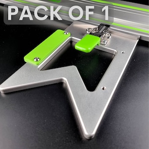 May include: A silver metal woodworking tool with a green plastic handle and a green plastic latch. The tool is shaped like a triangle with a cut-out in the centre. The text "PACK OF 1" is visible in the background.