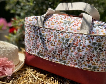 Hand-stitched cotton floral handbag