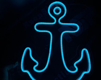 Puede incluir: Un letrero de ancla de neón azul. El ancla es de diseño tradicional con un anillo en la parte superior y dos brazos que se curvan hacia abajo para formar la base.