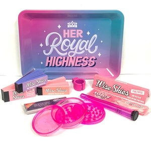 May include: A selection of smoking accessories. The image features a tray with the text "Her Royal Highness", pink and purple rolling papers, grinders, and a pink ring. The tray has a pink and blue gradient.