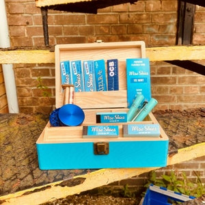 Grande boîte à roulettes bleue pour concasseurs, embouts, accessoires pour rouler les tubes Doob