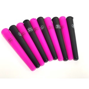 May include: A set of eight pink and black plastic cigarette rolling tubes with the logo "Wise Skies" printed on them.