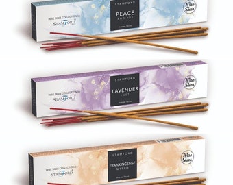 May include: Three boxes of incense sticks with different scents. The boxes are blue, purple, and orange with watercolor designs. The boxes are labeled "Peace and Joy", "Lavender Lust", and "Frankincense Myrrh".