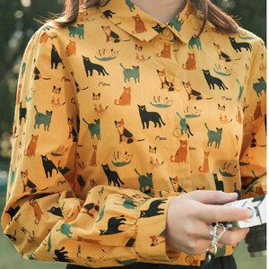 Blusas con estampados de gatos online