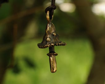 Mini bronze mushroom pendant.