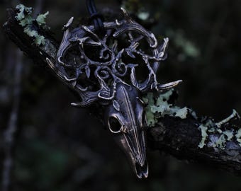 Large solid bronze stag skull pendant with a triskelion, symbol of renewal