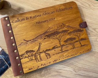 Livre d'aventures de paysages africains, carnet de voyage safaris et girafes, montagne du Kilimandjaro dans la savane Album photo de notre anniversaire de voyages