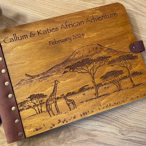 Libro di avventure sui paesaggi africani, diario di viaggio con safari e giraffe, album fotografico del nostro anniversario di viaggio sul monte Kilimanjaro nella savana