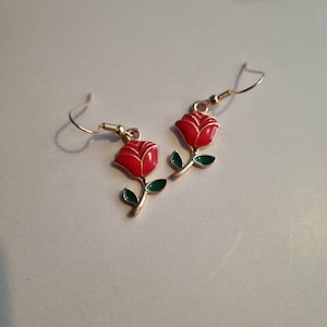 Rose, valentines present, beauty and the beast earrings. Gold plated fish hook dangle red roses.