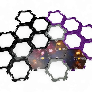 May include: A collection of hexagonal game tiles with black, gray, and purple frames. Some tiles feature a galaxy design with icons and text. The tiles are arranged in a honeycomb pattern against a white background.