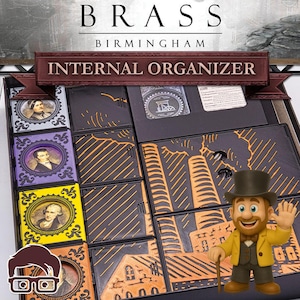 Op de afbeelding: Een interne organizer voor het bordspel "Brass: Birmingham". De organizer is zwart met oranje accenten en heeft compartimenten voor spelonderdelen en kaarten. De afbeelding bevat het logo van het spel en een cartoonfiguur.