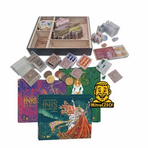 May include: A board game set featuring the Inis and Inis: Seasons of Inis expansion boxes with colorful Celtic-inspired artwork. The set includes a wooden organizer tray, various plastic card holders, small colored plastic figures, and circular tokens.