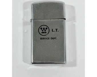 Encendedor Zippo Slim Westinghouse de cromo pulido, año 1966