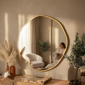 Gold Framed Organic Shape Wall Mirror...