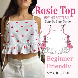 Puede incluir: Un top corto blanco con estampado de corazones rojos, con tirantes finos y lazos laterales con un dobladillo con volantes. La imagen incluye el texto Rosie Top, Sewing Pattern, Step By Step Guide, Beginner Friendly y Sizes: XXS - XXXL.