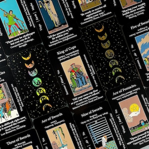 May include: A collection of tarot cards with black backgrounds and colorful illustrations. The cards feature images of figures, symbols, and text, including "King of Cups" and "Ace of Pentacles". The cards are arranged in a slightly overlapping pattern.