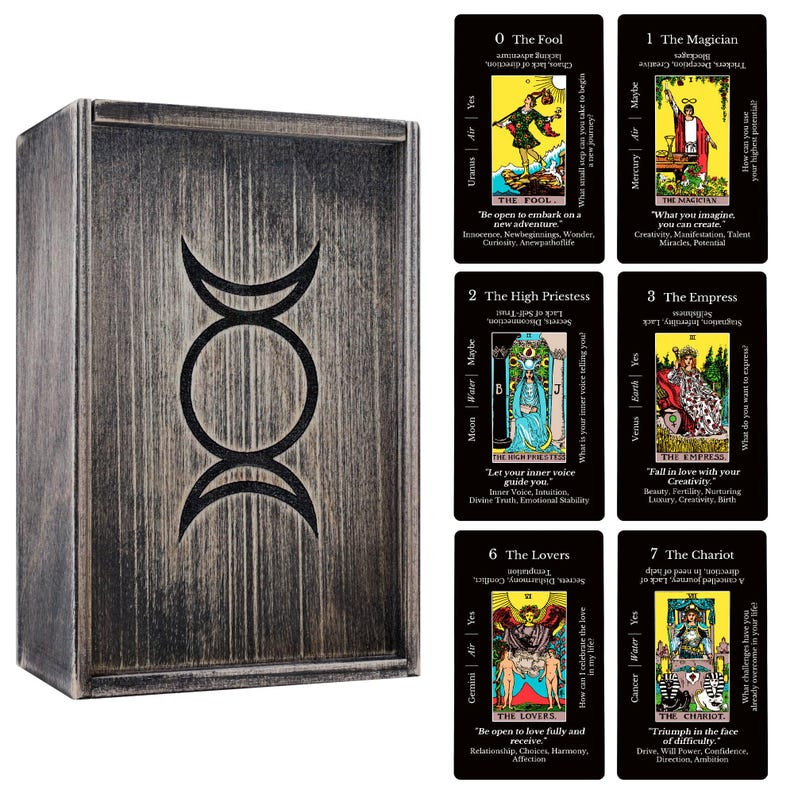 May include: A wooden tarot card box with a triple moon symbol, next to a selection of tarot cards. The box has a distressed, gray finish. The tarot cards feature colorful illustrations and text, including "The Fool" and "The Magician."
