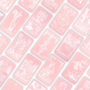 May include: A collection of pink tarot cards with white illustrations and text. The cards feature images of The Sun, The Hermit, The Chariot, The Hanged Man, The Lovers, and The Fool. The cards are arranged diagonally across a white background.