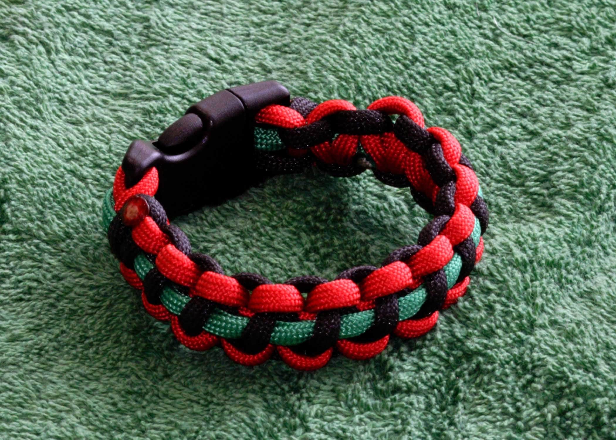 Red, Black and Green Cobra Weave Paracord Bracelet With Buckle 
