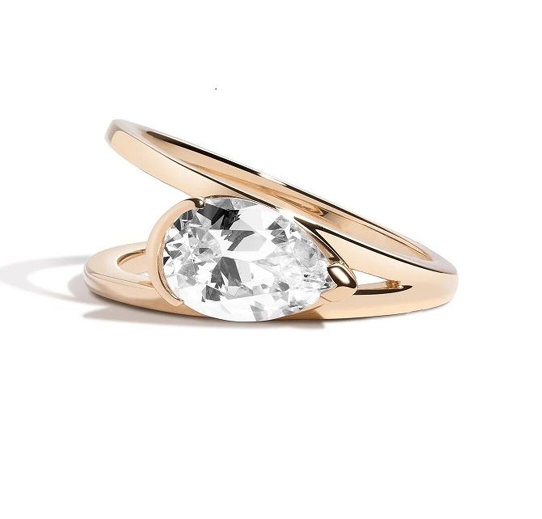 East West Pear Cut Moissanite Diamond Solitaire Ring Half Bezel Set