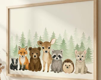 May include: A framed watercolor print featuring a collection of woodland animals: a fox, bear, deer, raccoon, hedgehog, and wolf. The background depicts a forest of green trees. The artwork is in a light wood frame.