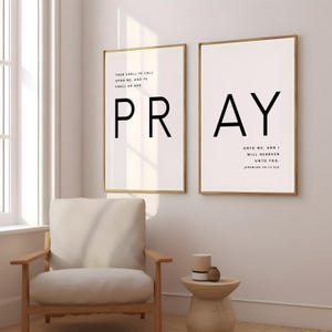May include: Two framed prints with the word "PRAY" in large black letters. The left print has the text "Then shall ye call upon me, and ye shall go and" above the word "PRAY". The right print has the text "unto me, and I will hearken unto you. Jeremiah 29:12 KJV" below the word "PRAY".