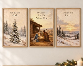 May include: A set of three framed wall art prints. The left print shows a snowy forest with a decorated Christmas tree and the text Joy to the World. The center print depicts a nativity scene with the text O Come, Let Us Adore Him. The right print shows a winter landscape at sunset with the text Peace on Earth.