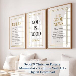 May include: Three framed Christian posters with gold text on a white background. The posters feature inspirational messages and scripture verses. The frames are light wood, and the style is minimalist. The posters are displayed on a white wall.