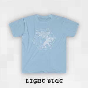 May include: A light blue t-shirt with a white graphic of a dragon inside a geometric shape.