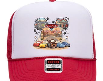 May include: A red and white trucker hat featuring a graphic print of the Disney Pixar Cars characters Lightning McQueen, Mater, and others. The design includes a race track, a gas station, and the Cars logo. An Otto brand label is on the brim.