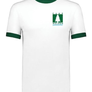May include: White ringer t-shirt with green trim on the collar and sleeves. The shirt features a green square logo with a tree and the words "CAMP WALDEN" in green and blue.